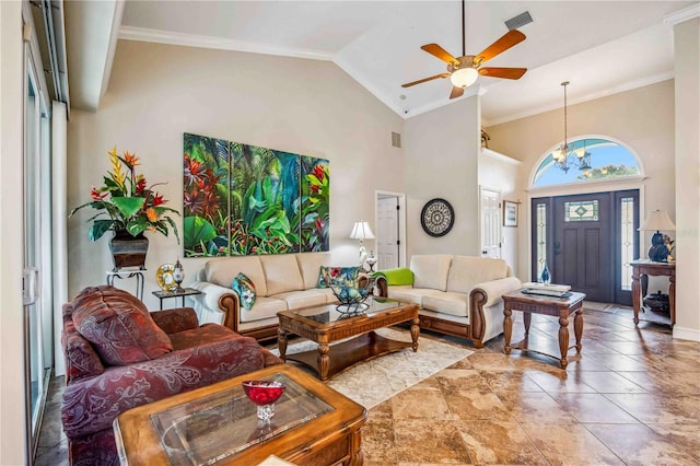 living room featuring ornamental molding, ceiling fan, and high vaulted ceiling