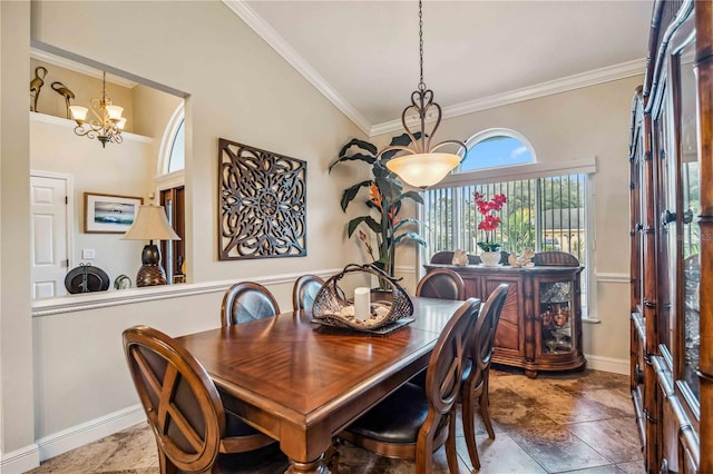 dining space featuring ornamental molding and a chandelier