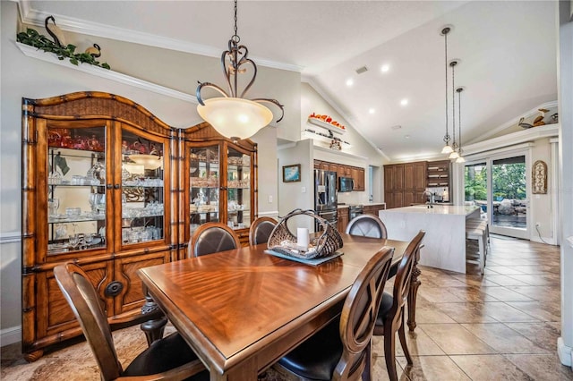 dining area with ornamental molding, sink, light tile patterned floors, and high vaulted ceiling