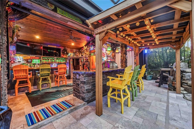 view of patio with outdoor dry bar