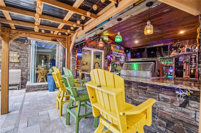 interior space featuring wood ceiling and stone tile floors