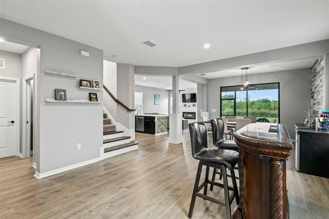 interior space with light hardwood / wood-style flooring and dishwasher