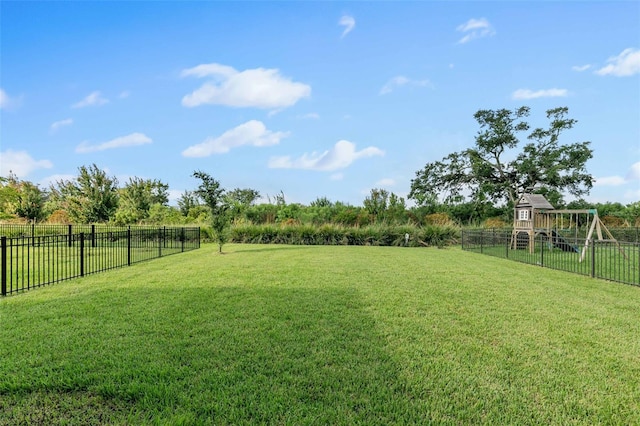 view of yard with a rural view