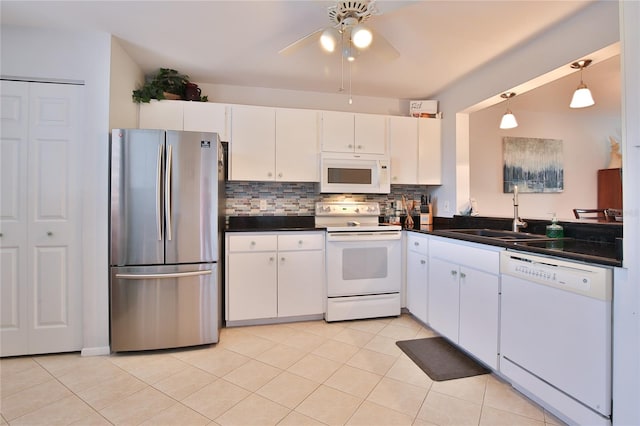 kitchen with white cabinets, white appliances, pendant lighting, tasteful backsplash, and sink