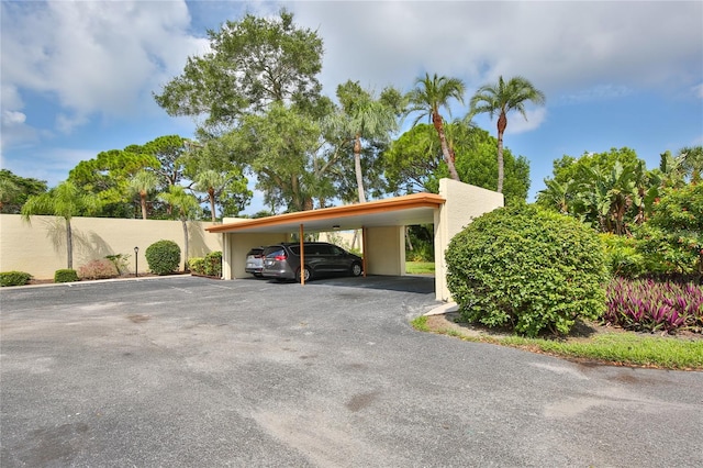 view of car parking featuring a carport