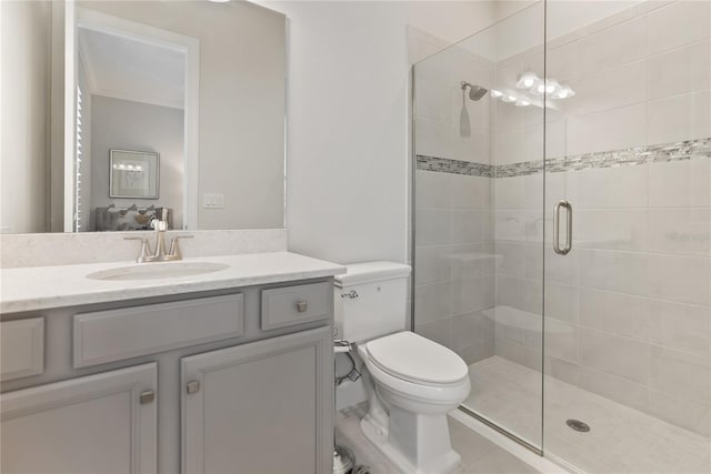 bathroom featuring vanity, toilet, and walk in shower