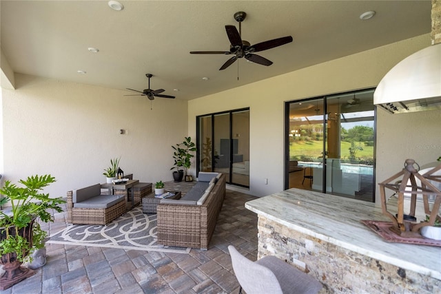 view of patio / terrace featuring outdoor lounge area and ceiling fan