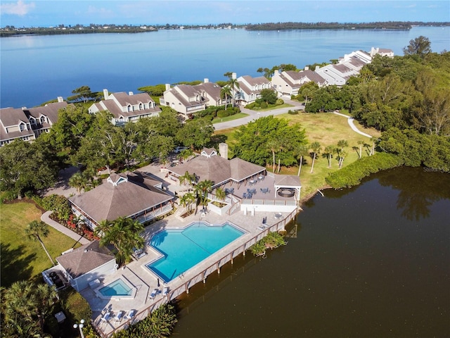 aerial view featuring a residential view and a water view