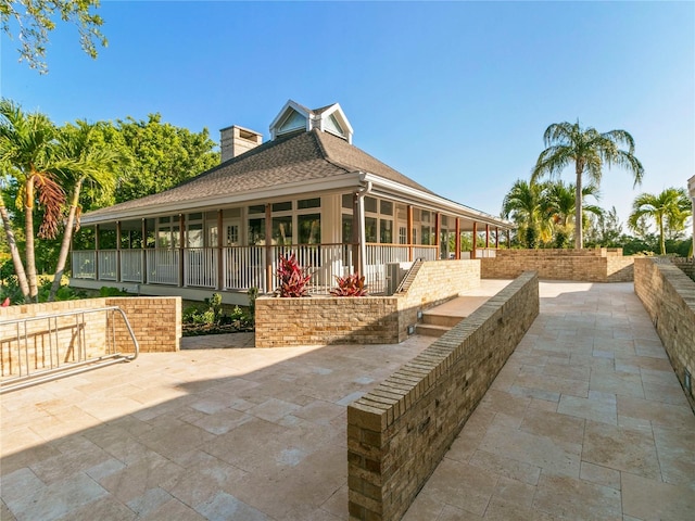 surrounding community with a patio area