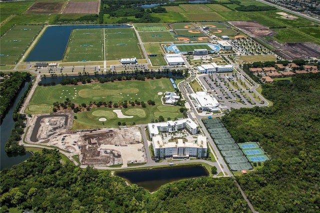 birds eye view of property featuring a water view