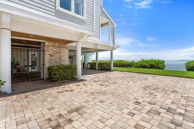 view of patio / terrace featuring a water view