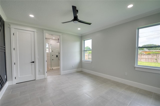 unfurnished bedroom featuring crown molding, a textured ceiling, light tile patterned floors, ceiling fan, and connected bathroom