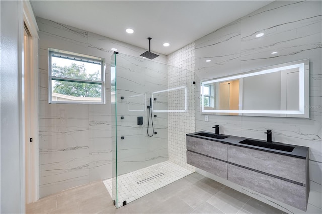 bathroom featuring vanity, tile patterned flooring, and an enclosed shower