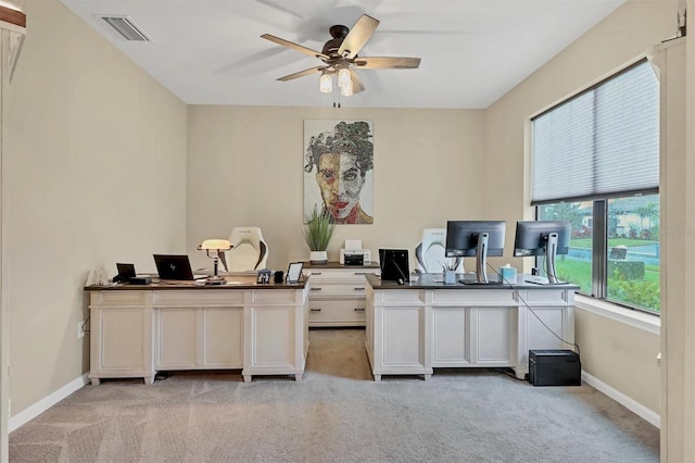 office featuring ceiling fan and light colored carpet