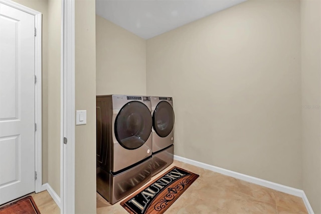 laundry area featuring washing machine and dryer