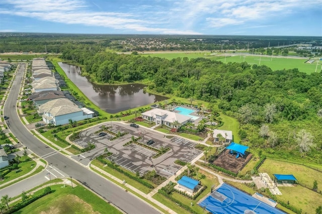 drone / aerial view with a water view