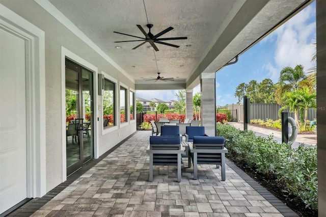 view of patio / terrace featuring ceiling fan, outdoor lounge area, and french doors