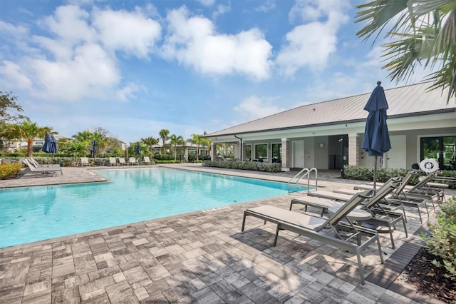 view of pool with a patio area