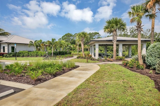 view of community with a yard and a gazebo