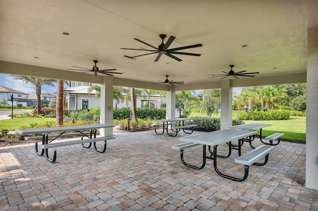 view of patio featuring ceiling fan