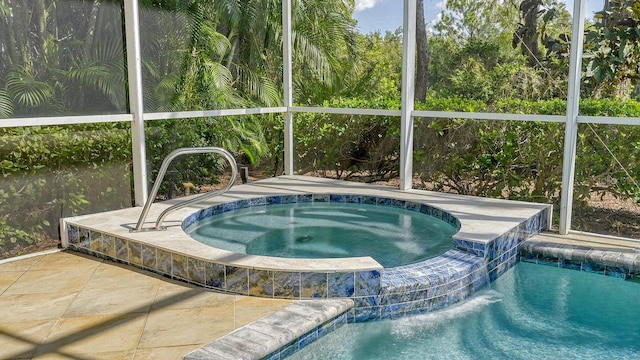 view of swimming pool featuring an in ground hot tub