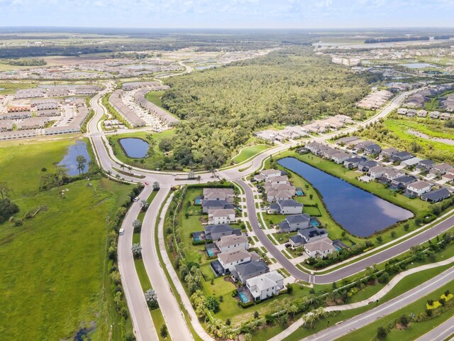 drone / aerial view featuring a water view