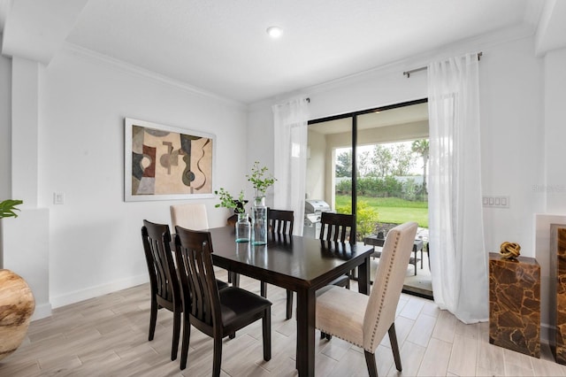 dining room with crown molding