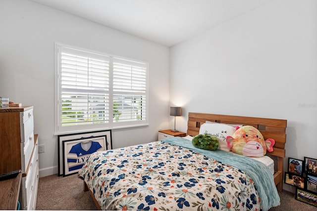 bedroom featuring carpet