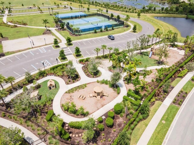 birds eye view of property with a water view