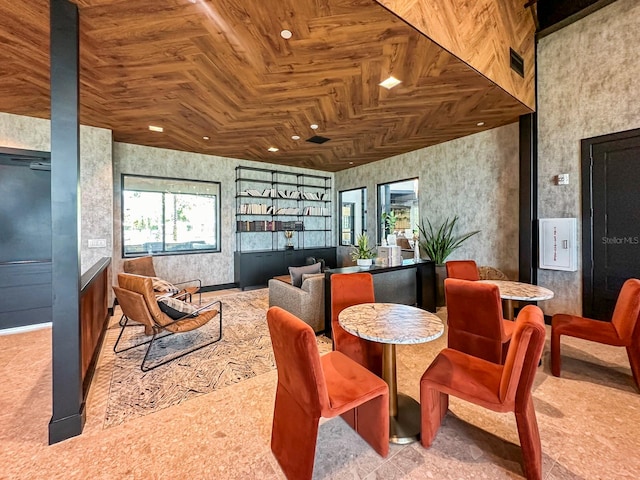 sunroom / solarium featuring wood ceiling