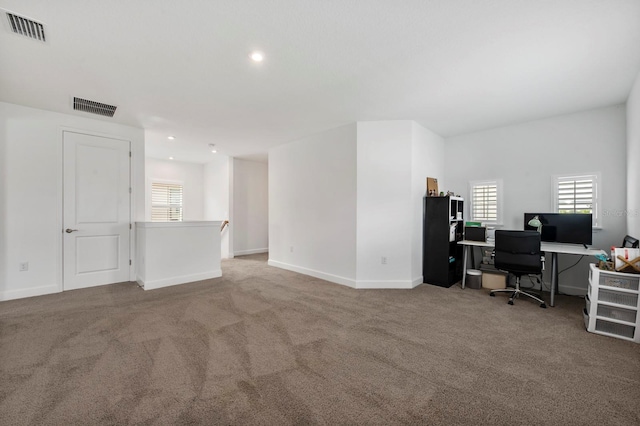 view of carpeted office space