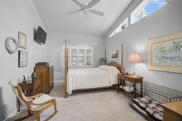 bedroom featuring carpet, vaulted ceiling, and ceiling fan