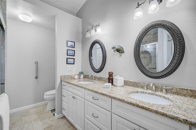 bathroom featuring dual bowl vanity, tile patterned flooring, and toilet