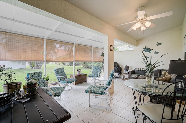 sunroom / solarium with ceiling fan