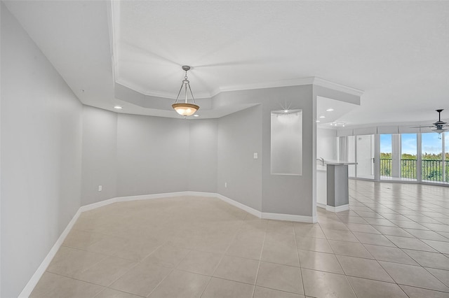 unfurnished room featuring light tile patterned floors, ornamental molding, and ceiling fan