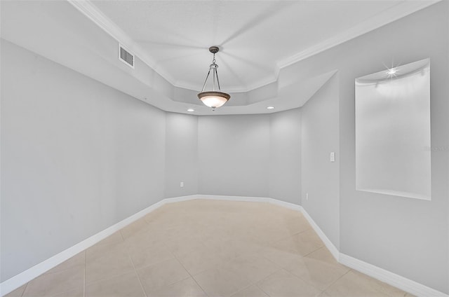 unfurnished room featuring crown molding and light tile patterned floors