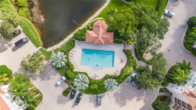 birds eye view of property featuring a water view