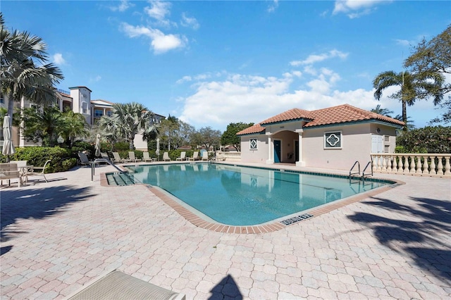 view of pool featuring a patio