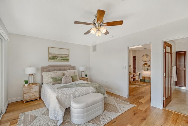 bedroom with ceiling fan and light wood-type flooring