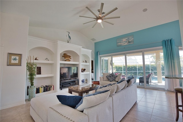 tiled living room with ceiling fan, built in shelves, and lofted ceiling