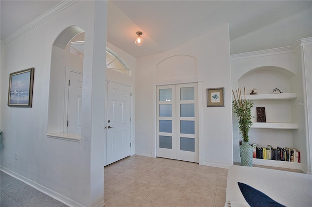 foyer with lofted ceiling and light tile patterned flooring