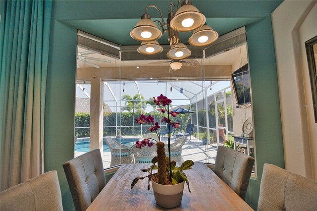 dining room featuring a raised ceiling