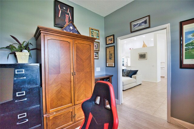 office with light tile patterned flooring