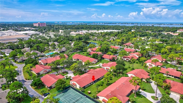 birds eye view of property featuring a water view