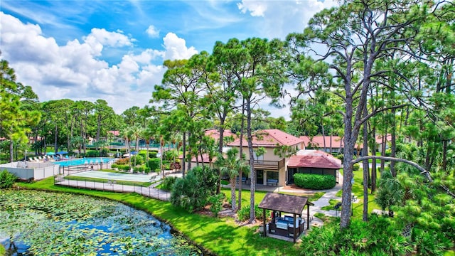 exterior space with a patio and a community pool