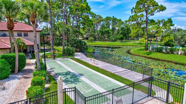 view of community featuring a lawn