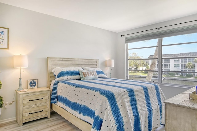 bedroom featuring light wood-type flooring