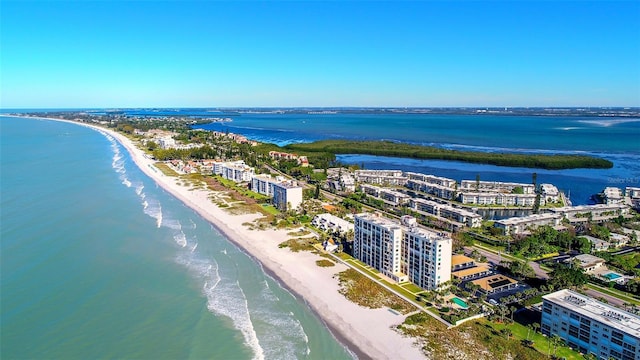 bird's eye view with a beach view and a water view