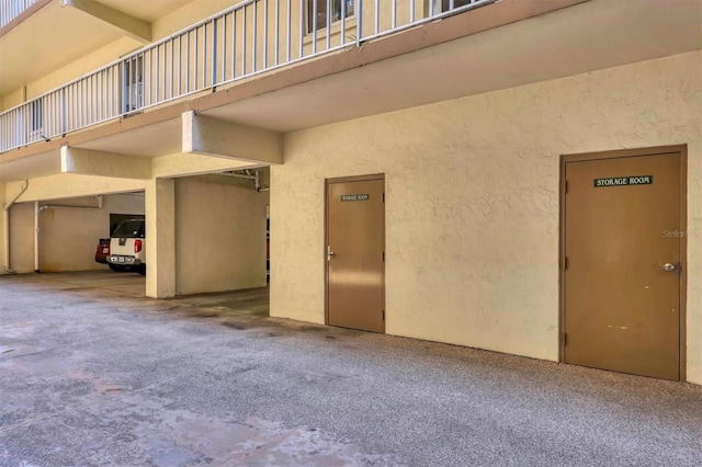 exterior space featuring stucco siding