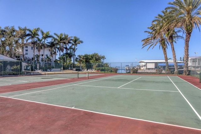 view of sport court with fence